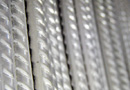 Custom-formed stainless steel reinforcing bar shapes